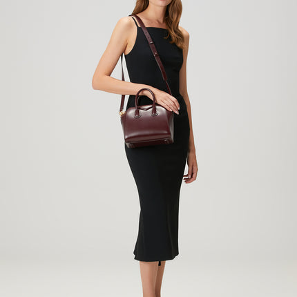 Fall/Winter 2025 styling of Givenchy Mini Antigona Burgundy Bag