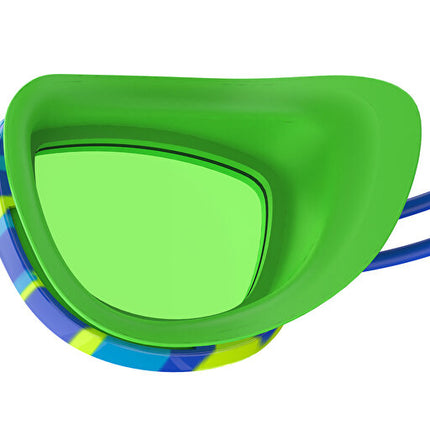 Colorful swim goggles with a green lens on a white background