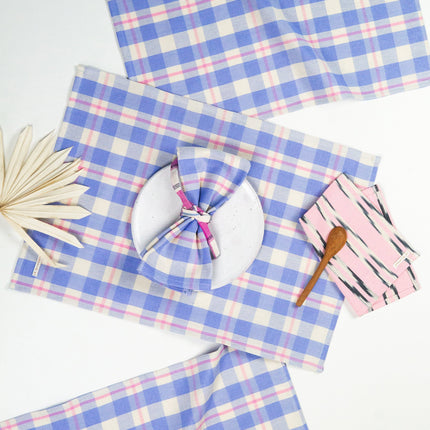 Handwoven Abigail plaid placemat in periwinkle blue and pink