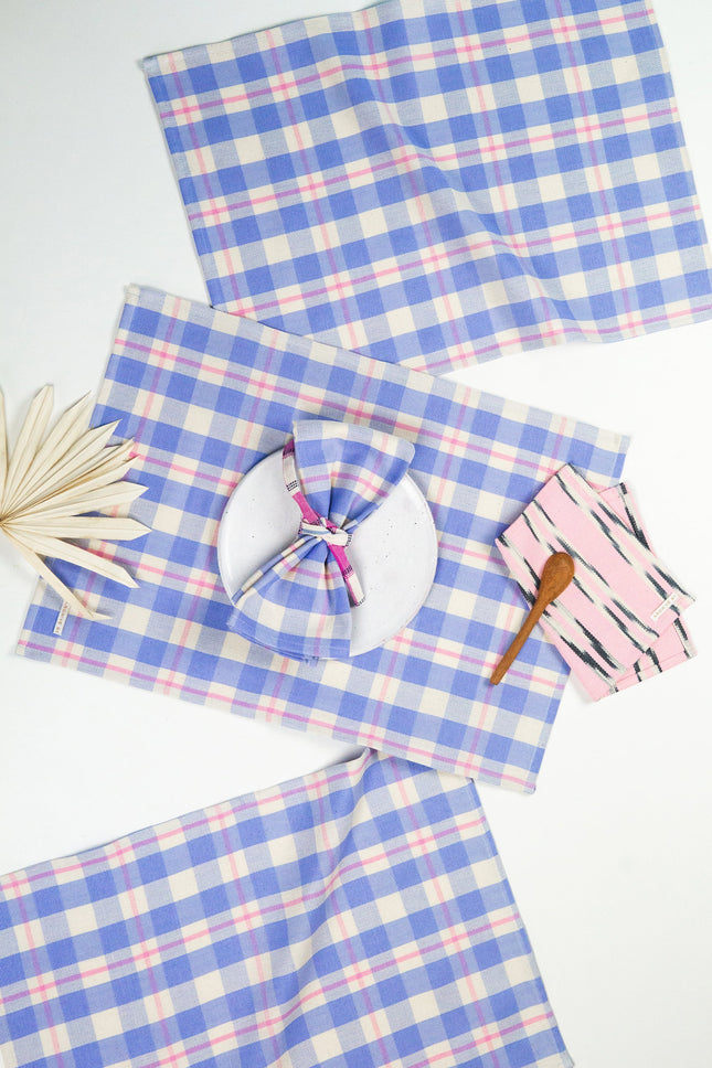 Handwoven Abigail plaid placemat in periwinkle blue and pink