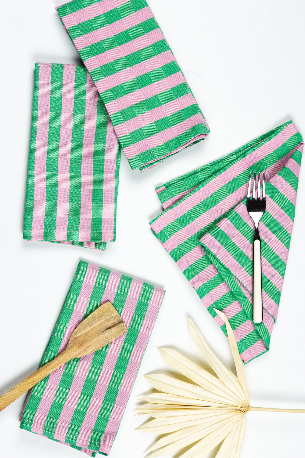 Handwoven flora stripe napkin in pink and green from Guatemala